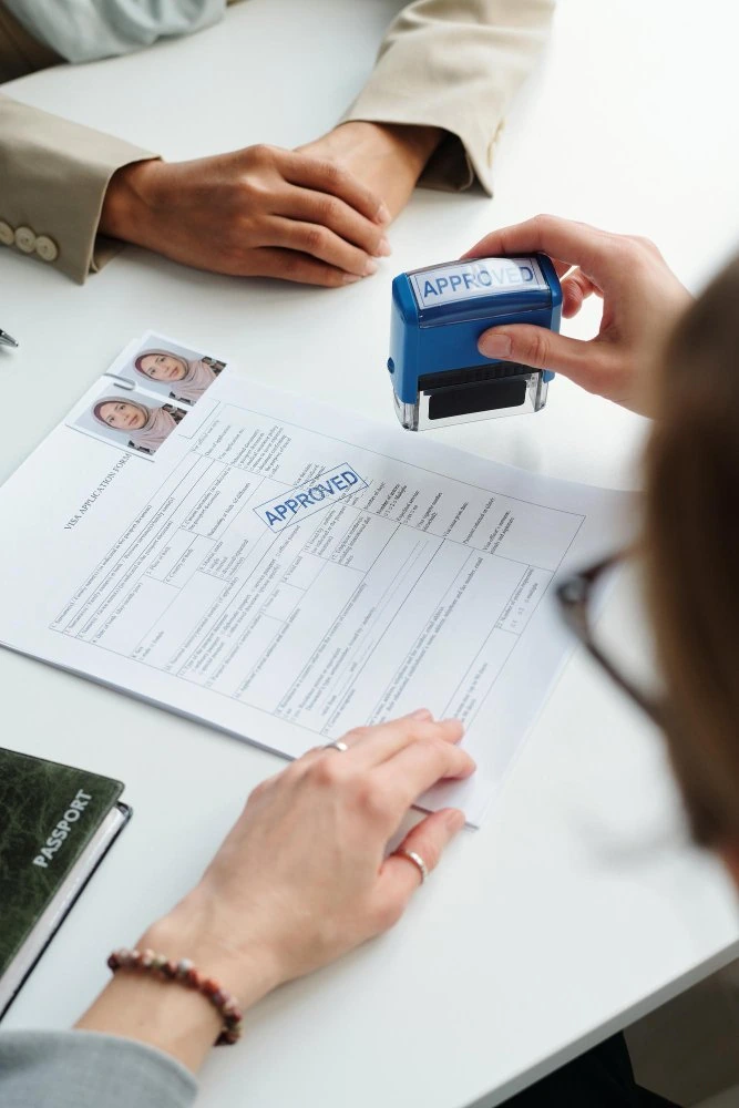 One Visa World consultant assisting a client with their Saudi business visa application